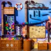 Colorful indoor playground wall featuring brown barrels, a spiral corkscrew, a glass ball maze, and a pirate-map panel on a blue background.