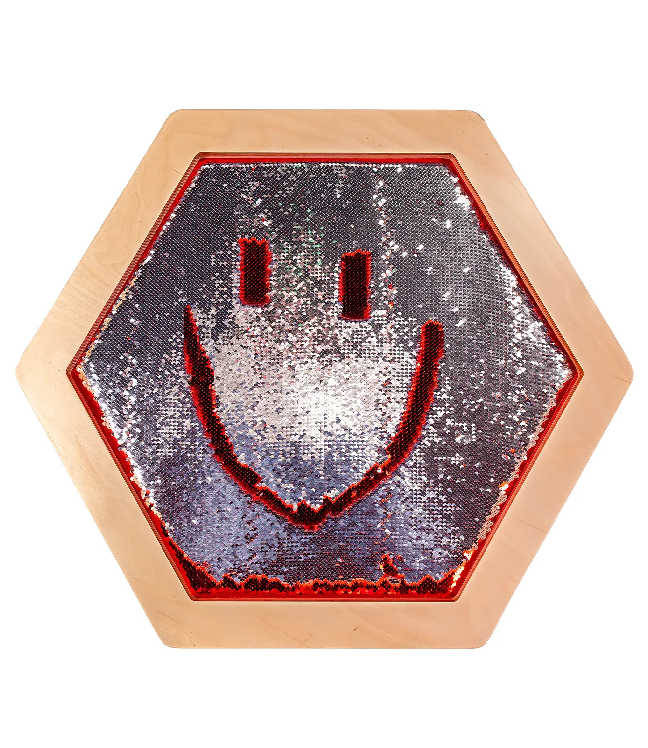sequin-flip-3 | LiteZilla Hexagonal, sequin-covered badge with a red smiling face on a pale wooden frame.