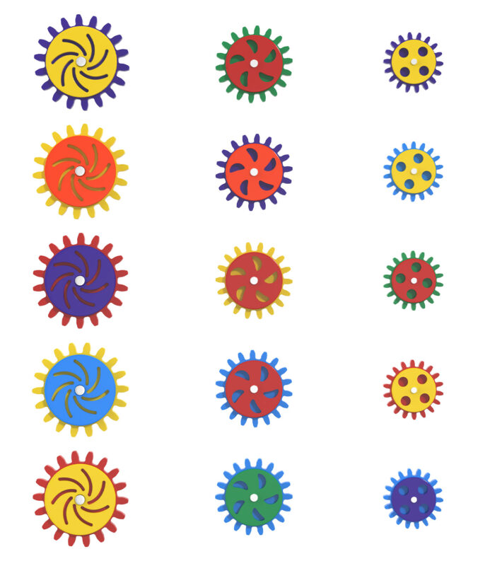 Grid of colorful gear shapes with teeth, in yellow, red, green, blue and purple, arranged in a pattern with various inner designs (spirals, dots).