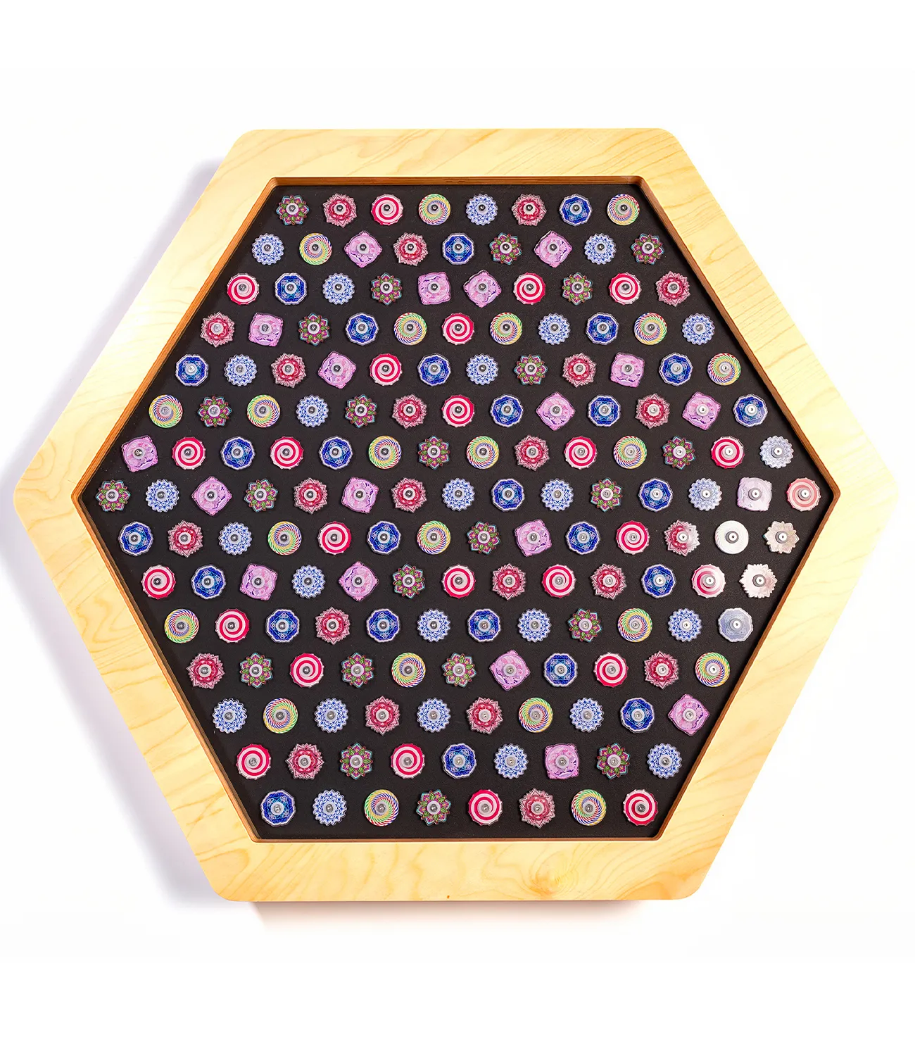 fidget-spinner-large-1 | LiteZilla Wooden hexagonal tray filled with dozens of colorful circular game pieces on a dark playing surface