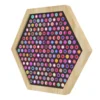 Hexagonal wooden frame with a black interior filled with rows of small multicolored circular pegs.