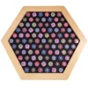 Hexagonal wooden tray filled with dozens of colorful fidget spinners on a black background surface.
