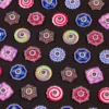 Assorted colorful mandala-style circular buttons arranged on a black background.